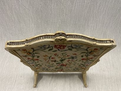Molded wood and tapestry fireside.
Louis...