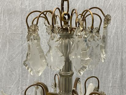 Pair of eight-light chandeliers. 
H. :83...
