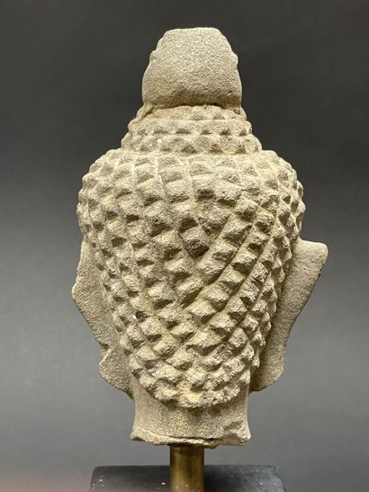 Old smiling Buddha head. Stoneware sculpture.
Siam...