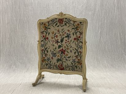 Molded wood and tapestry fireside.
Louis...