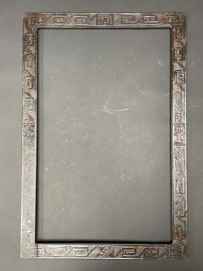 Leather frame decorated with drawings of...