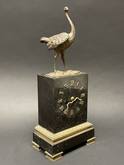 Ostrich clock.
Black marble base surmounted...