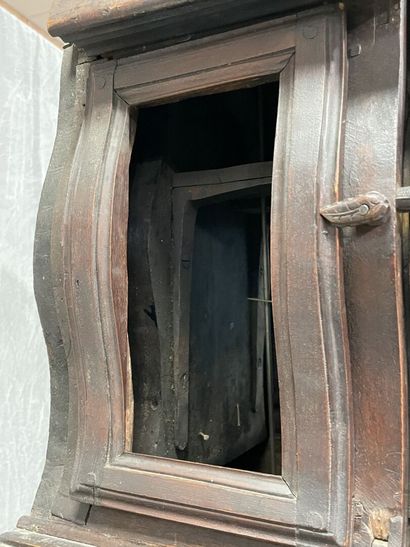 Carved oak floor clock, pewter dial supported...