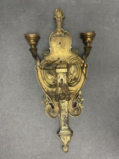 Large two-light bronze sconce with putto...