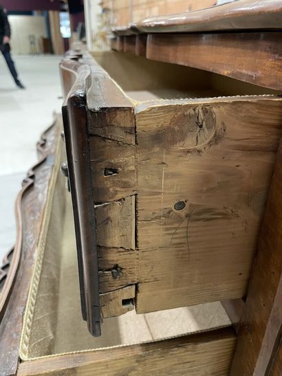 Molded walnut chest of drawers, crossbow...