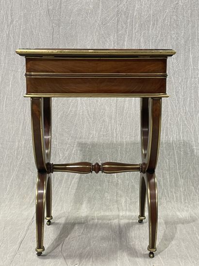 Mahogany veneered working table, underlined...