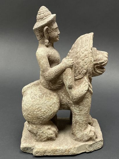 Vishnu riding the roaring Singha Lion, holding...