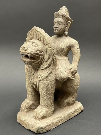 Vishnu riding the roaring Singha Lion, holding...