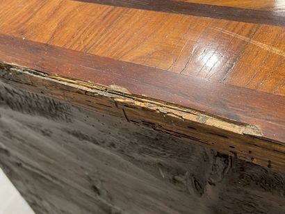 Rosewood-fringed chest of drawers, opening...