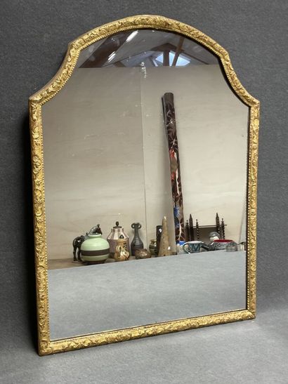 Gilded stucco frame mirror with scrolled...