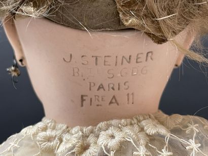STEINER Beautiful closed-mouth doll, debossed...
