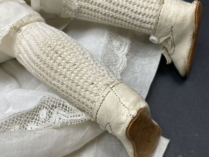 Parisian communion doll with missal and cross....