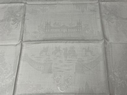 Set of nine large damask linen napkins decorated...