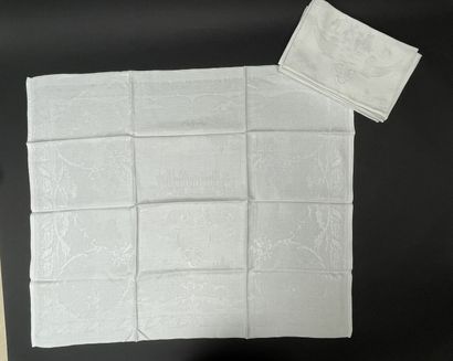 Set of nine large damask linen napkins decorated...