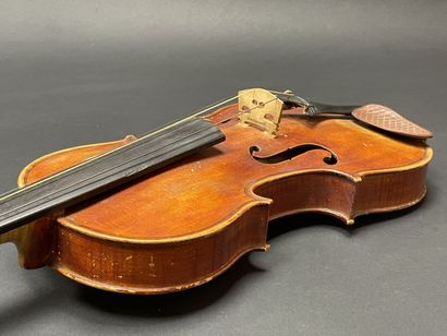 Violin in case, bearing a label 