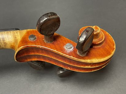 Violin in case, bearing a label 