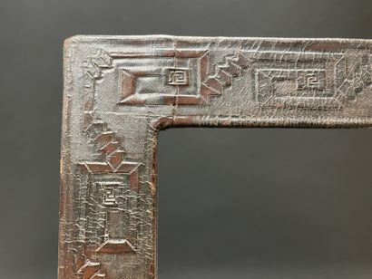 Leather frame decorated with drawings of...