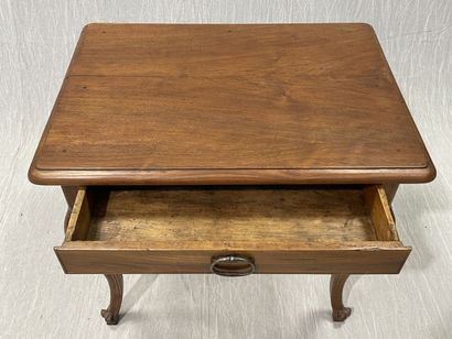 Walnut coffee table, opening to a drawer...