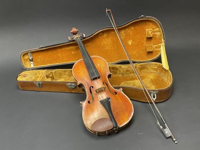 Violin in case, bearing a label 