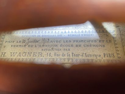 Violin in case, bearing a label 