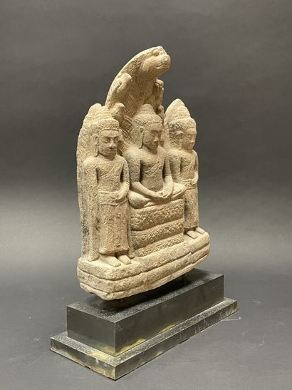 Buddhist triad depicting Mucalinda Buddha...