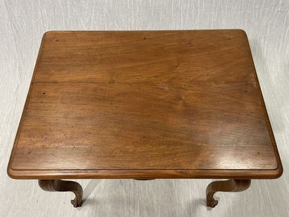 Walnut coffee table, opening to a drawer...
