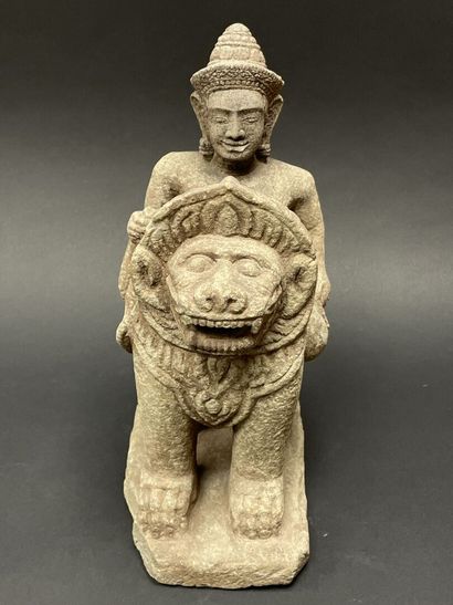 Vishnu riding the roaring Singha Lion, holding...