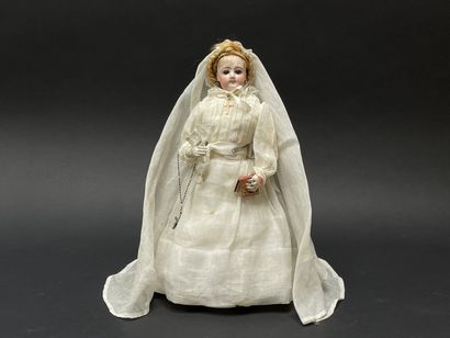 Parisian communion doll with missal and cross....