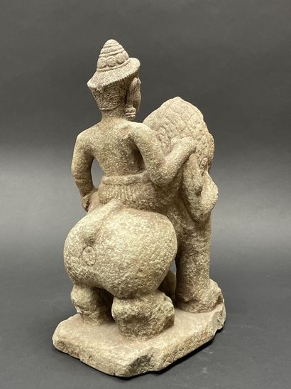 Vishnu riding the roaring Singha Lion, holding...