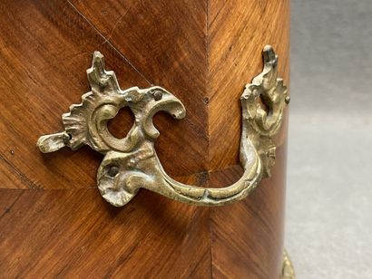 Wood veneer planter with bronze ornamentation....
