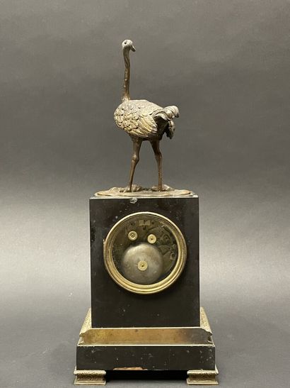Ostrich clock.
Black marble base surmounted...