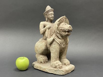 Vishnu riding the roaring Singha Lion, holding...