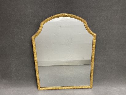 Gilded stucco frame mirror with scrolled...