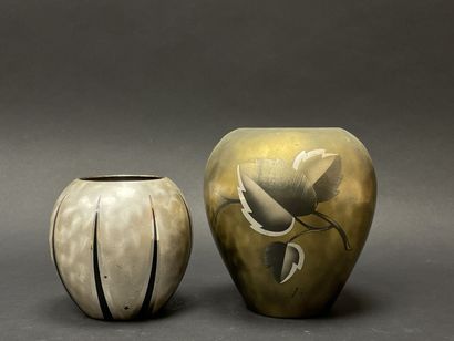Two ball vases in dinanderie.
Art deco.
H....