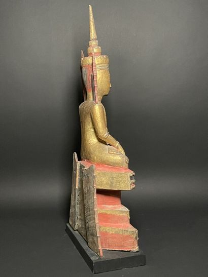 Buddha adorned in the royal effigy, wearing...