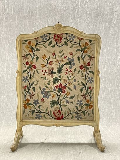 Molded wood and tapestry fireside.
Louis...