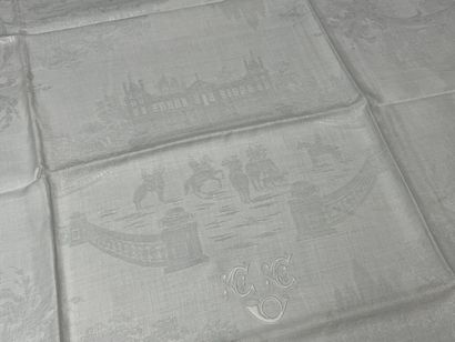 Set of nine large damask linen napkins decorated...