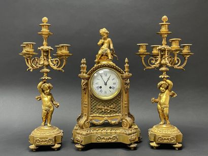 *Bronze mantelpiece with clock and pair of...