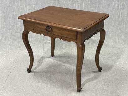 Walnut coffee table, opening to a drawer...