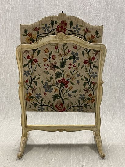 Molded wood and tapestry fireside.
Louis...