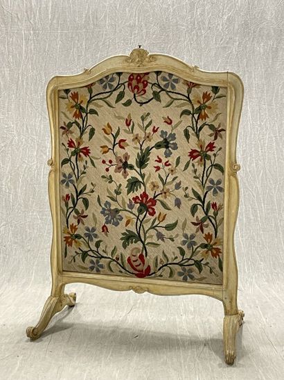 Molded wood and tapestry fireside.
Louis...