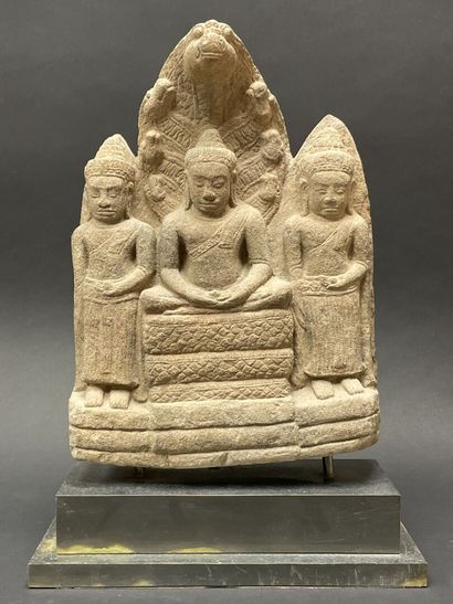 Buddhist triad depicting Mucalinda Buddha...