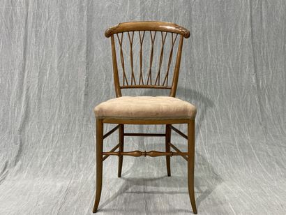 Suite de six chaises légères en bois blond,...