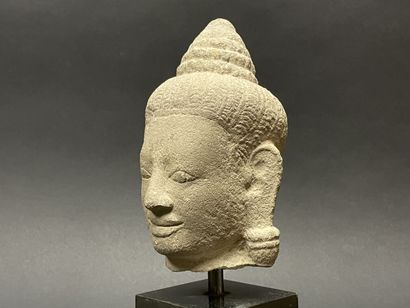 Tête de Bouddha au doux sourire, la tête...