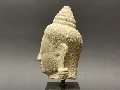 Tête de Bouddha au doux sourire, la tête...