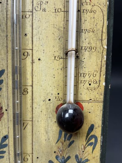 Baromètre en bois peint. 
début XIX° siècle.
95...