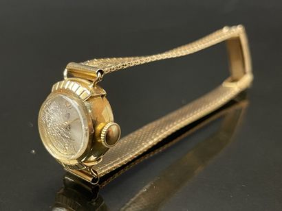 LIP Montre bracelet de dame en or. 750°/00.
Cadran:...