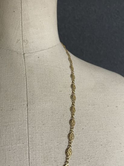 Sautoir en or maille draperie.
Or 750°/00
L:...