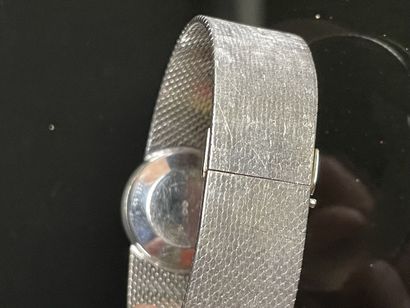 Montre en or gris , cadran serti de diamants.
Or...