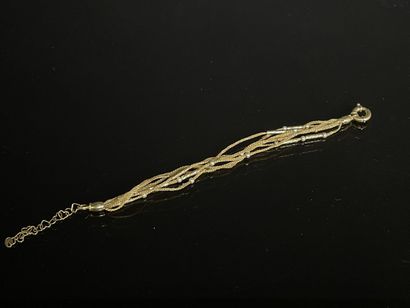 Bracelet en or, petites chaines et perles...